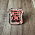 Nyssa Gluten pin featuring a detailed design, perfect for gluten-free advocates and pin collectors.