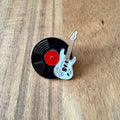 Nyssa record pin featuring a stylish design, perfect for collectors and fashion enthusiasts.