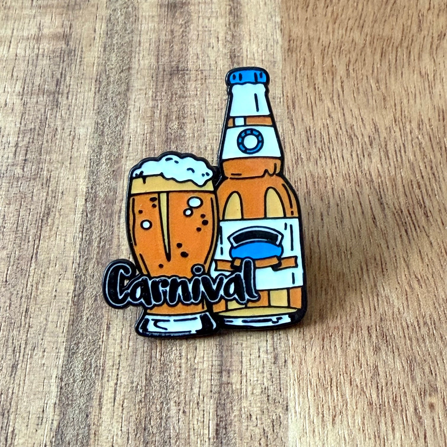 Nyssa Carnival pin featuring vibrant design, made of metal with colorful enamel detailing.