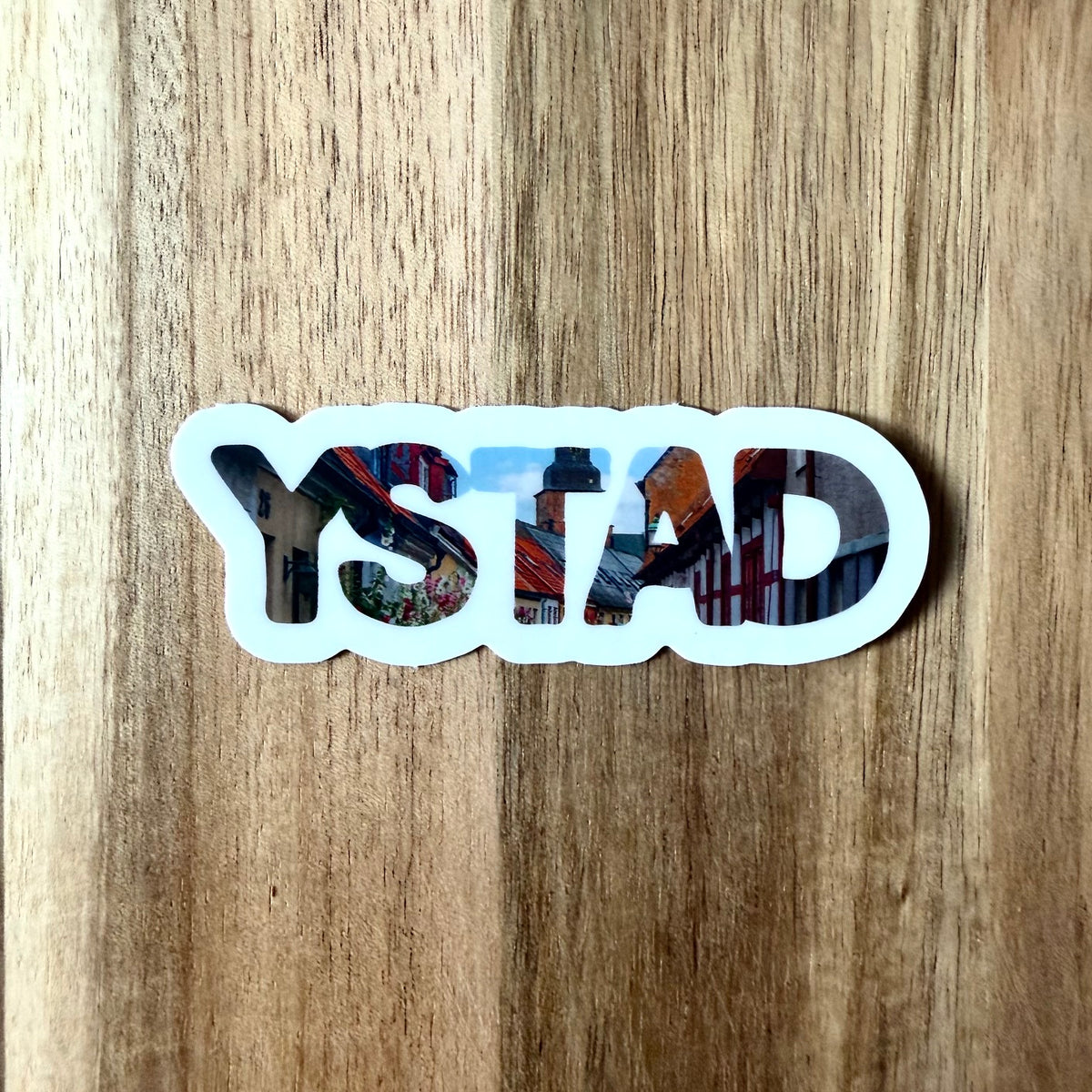 Nyssa YSTAD sticker featuring a colorful, artistic design on a white background, perfect for decorating notebooks or laptops.