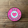 Nyssa "I'm a proud Swiftie" pin featuring a colorful design, perfect for fans of Taylor Swift to display their fandom.
