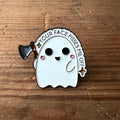 Nyssa "Your face pisses me off" pin showing a humorous face design on a metal lapel pin.