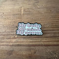 Nyssa "My body. My mind. My power" pin featuring bold text on a metal pin with a butterfly clasp.