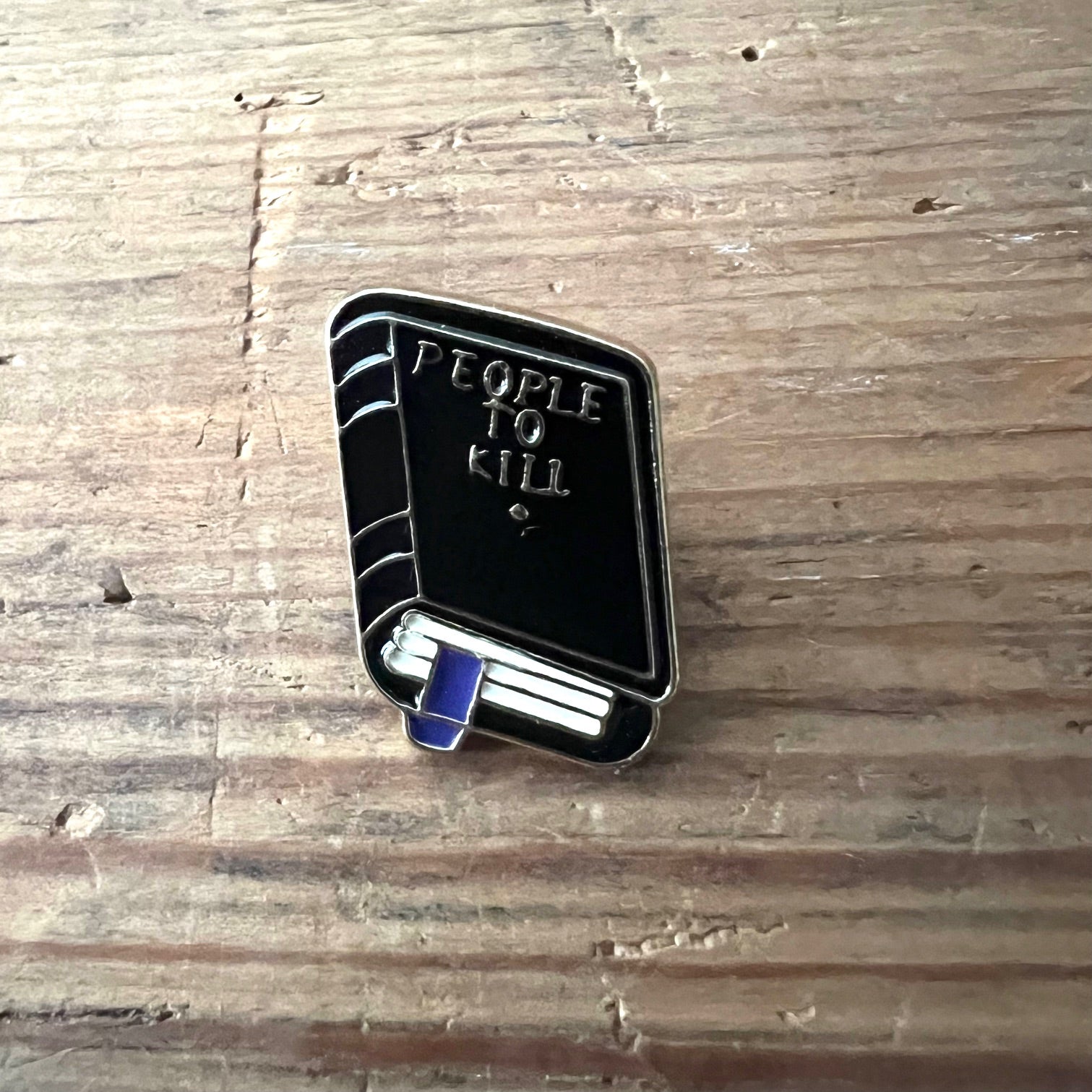 People to Kill pin by Nyssa featuring a detailed design, perfect for clothing or accessories.