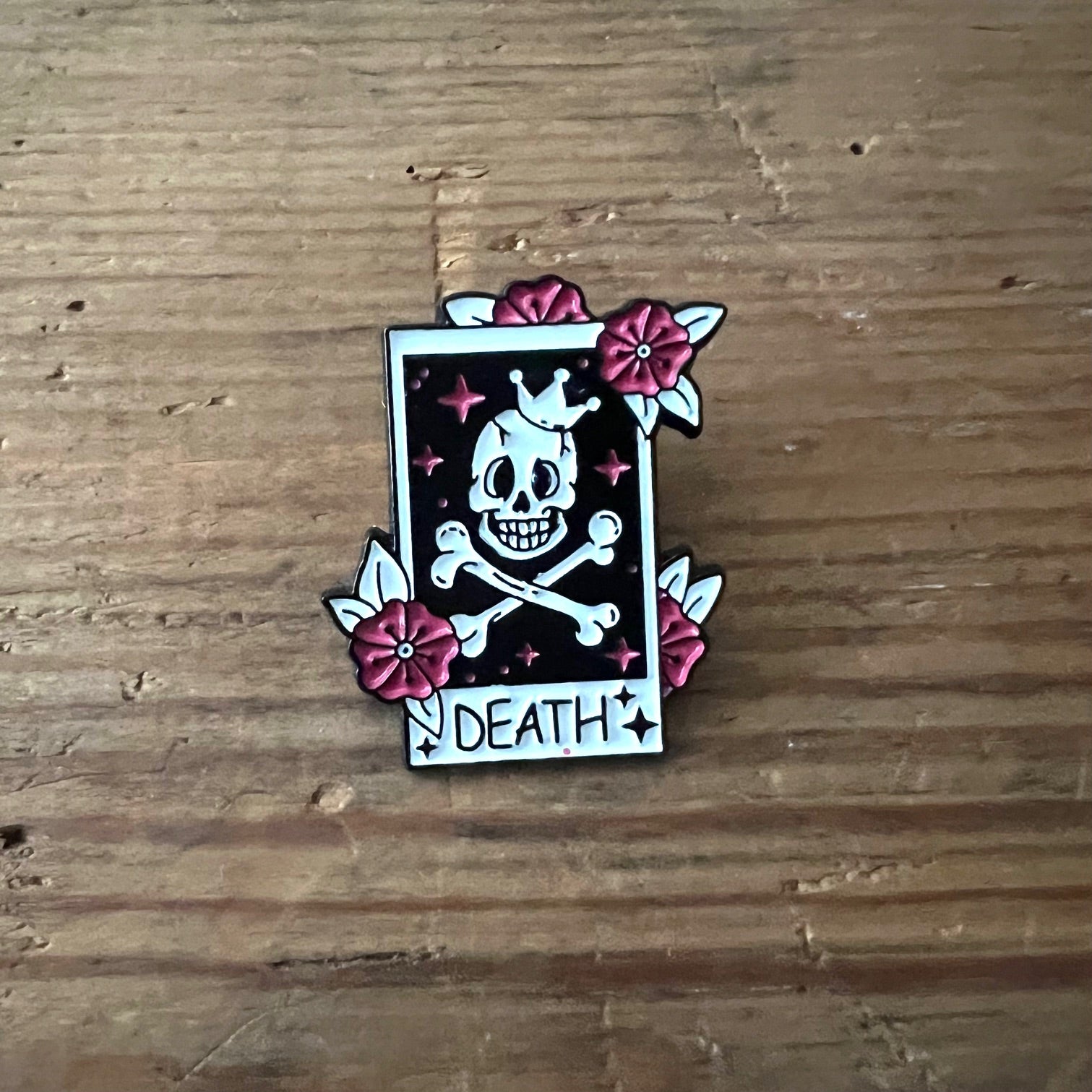 Black Death pin by Nyssa featuring a detailed skull design, perfect for accessories or apparel embellishment.