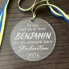 Nyssa studenthänge with "Fy fan vad du är bra!" message, featuring colorful design and festive decorations for celebrating students