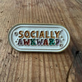 Socially Awkward Nyssa pin featuring a humorous design, perfect for expressing personality on clothing or accessories.