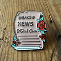 Breaking News pin by Nyssa featuring a vibrant design, perfect for accessorizing clothing or bags with a bold statement.