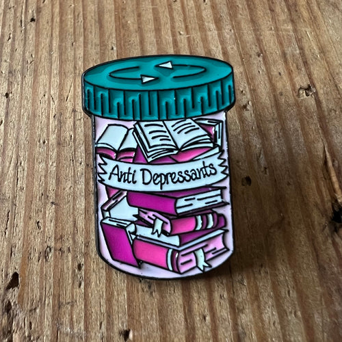 Nyssa anti-depressant pin featuring a sleek design, perfect for expressing support and awareness on clothing or accessories.