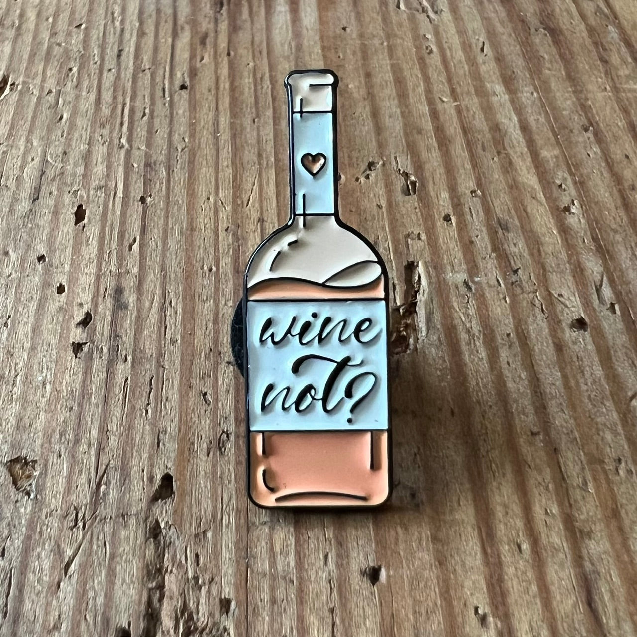 Nyssa Wine Not? pin featuring a playful wine glass design, perfect for wine lovers and stylish accessories.