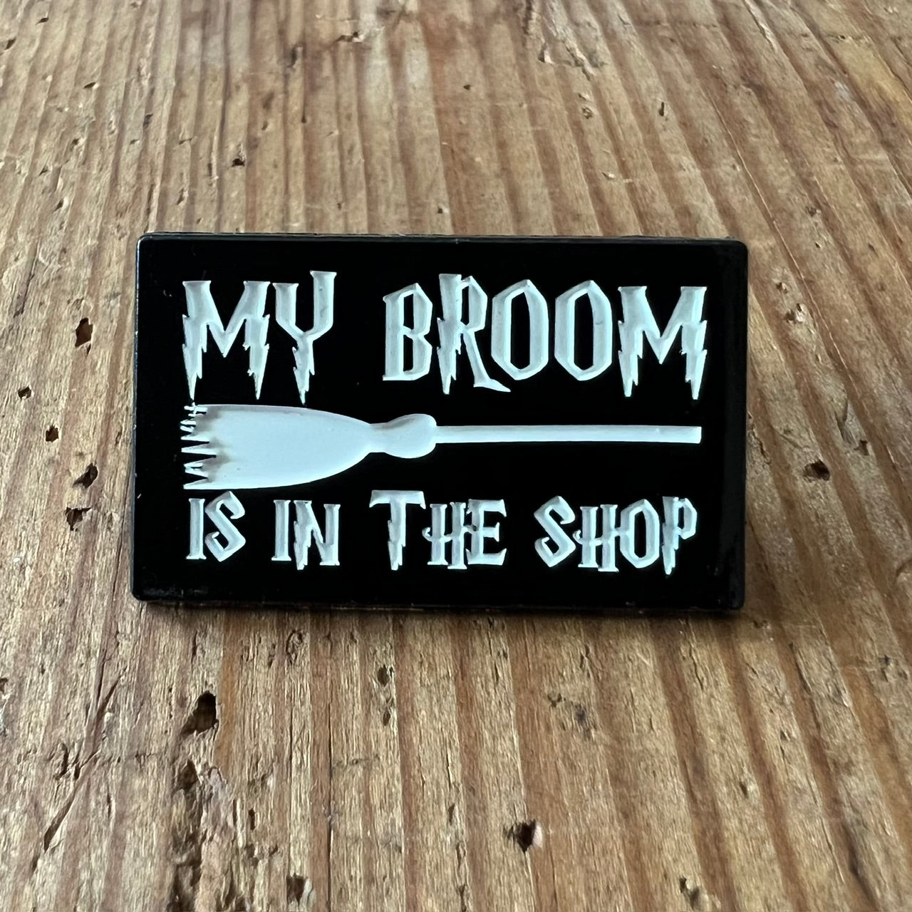 My Broom pin by Nyssa featuring a cute broom design, perfect as a decorative accessory or collectible pin.