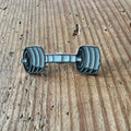 Nyssa Builder Pin showing a small metal decorative pin with the Builder logo, suitable for clothing or accessories.