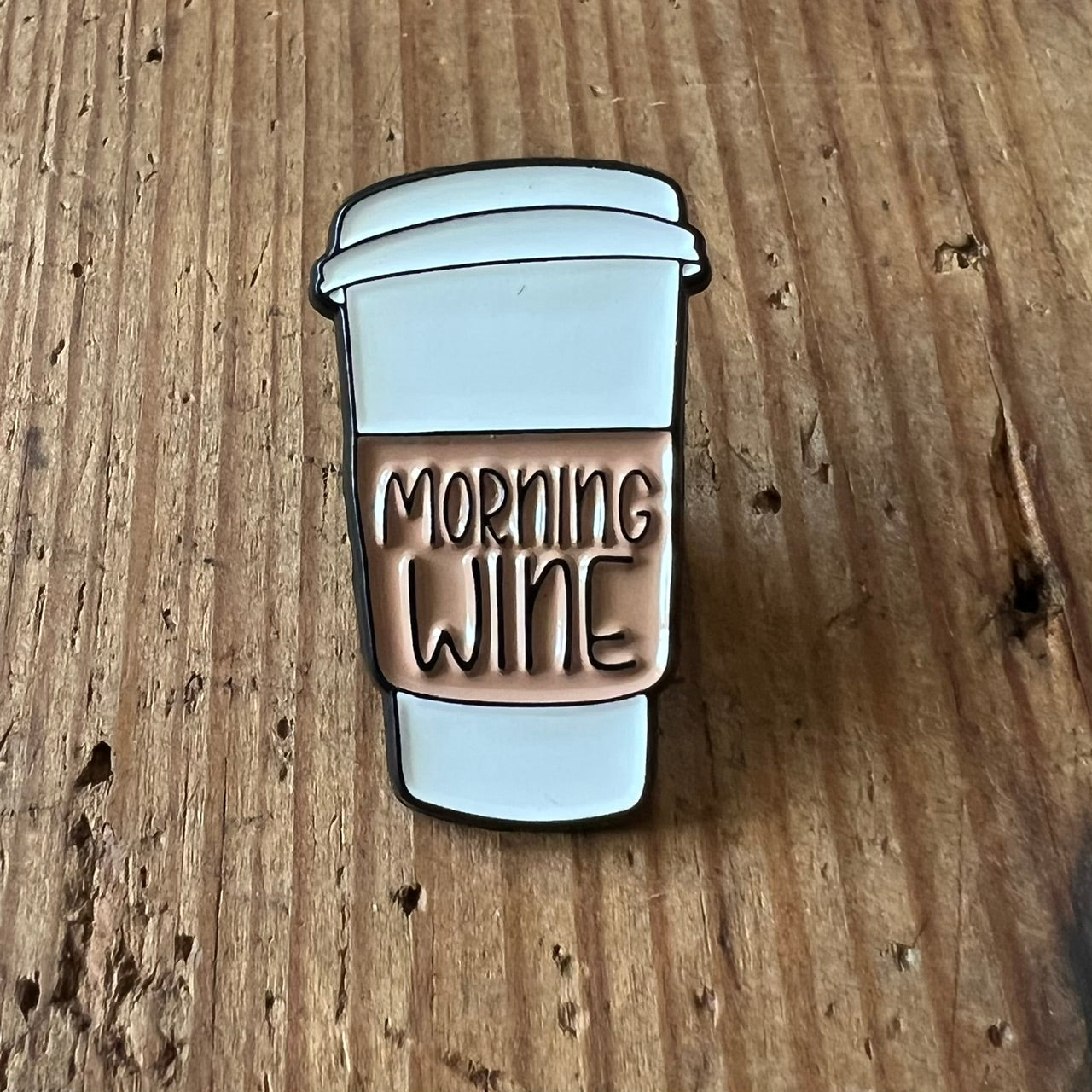 Nyssa Morning Wine pin featuring a colorful design, ideal for accessorizing or collecting, with vibrant artwork and detailed craftsmanship.
