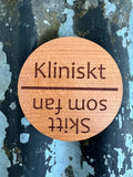 Nyssa dishwasher magnet with label for indicating wash cycle status, attached to a dishwasher door.