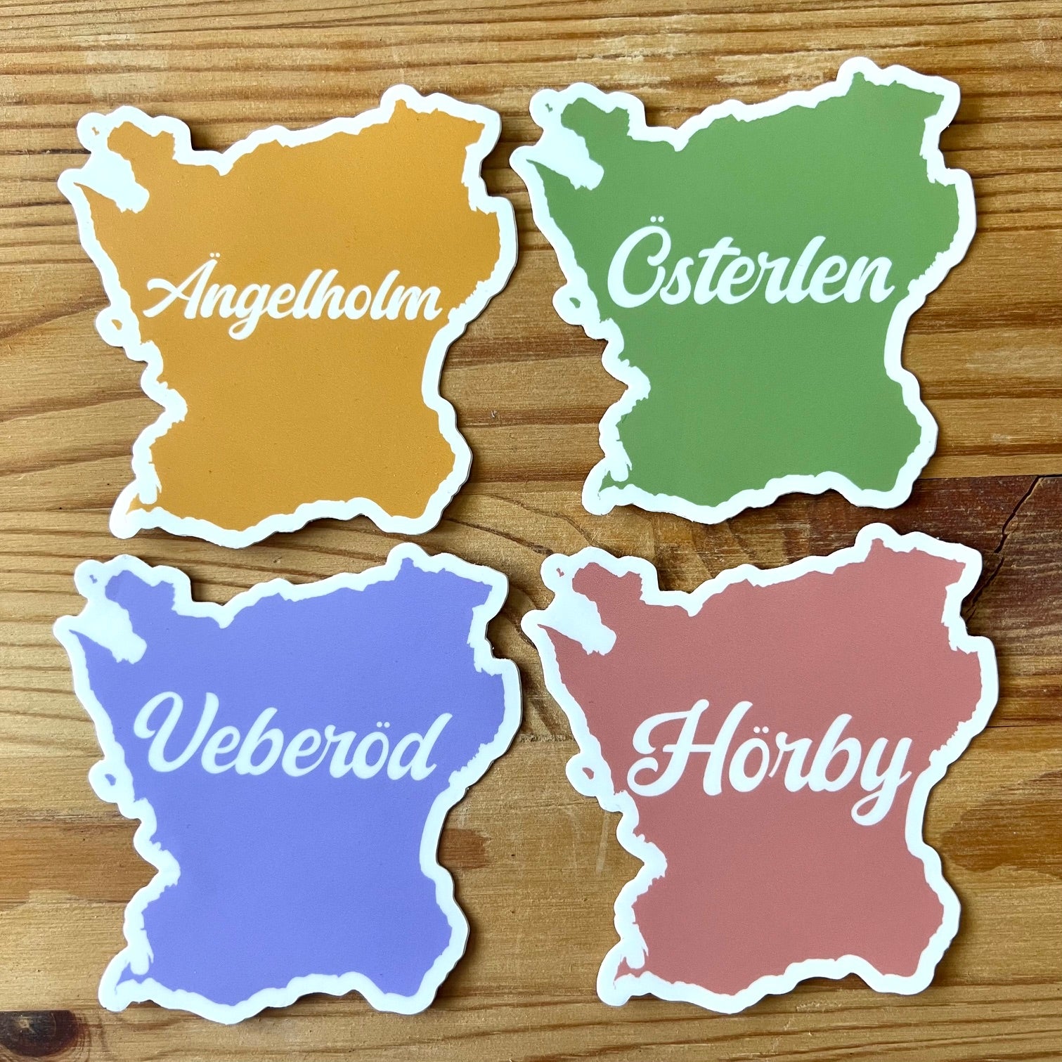 Nyssa Skåneorter sticker featuring colorful map design with city and town names on a white background.