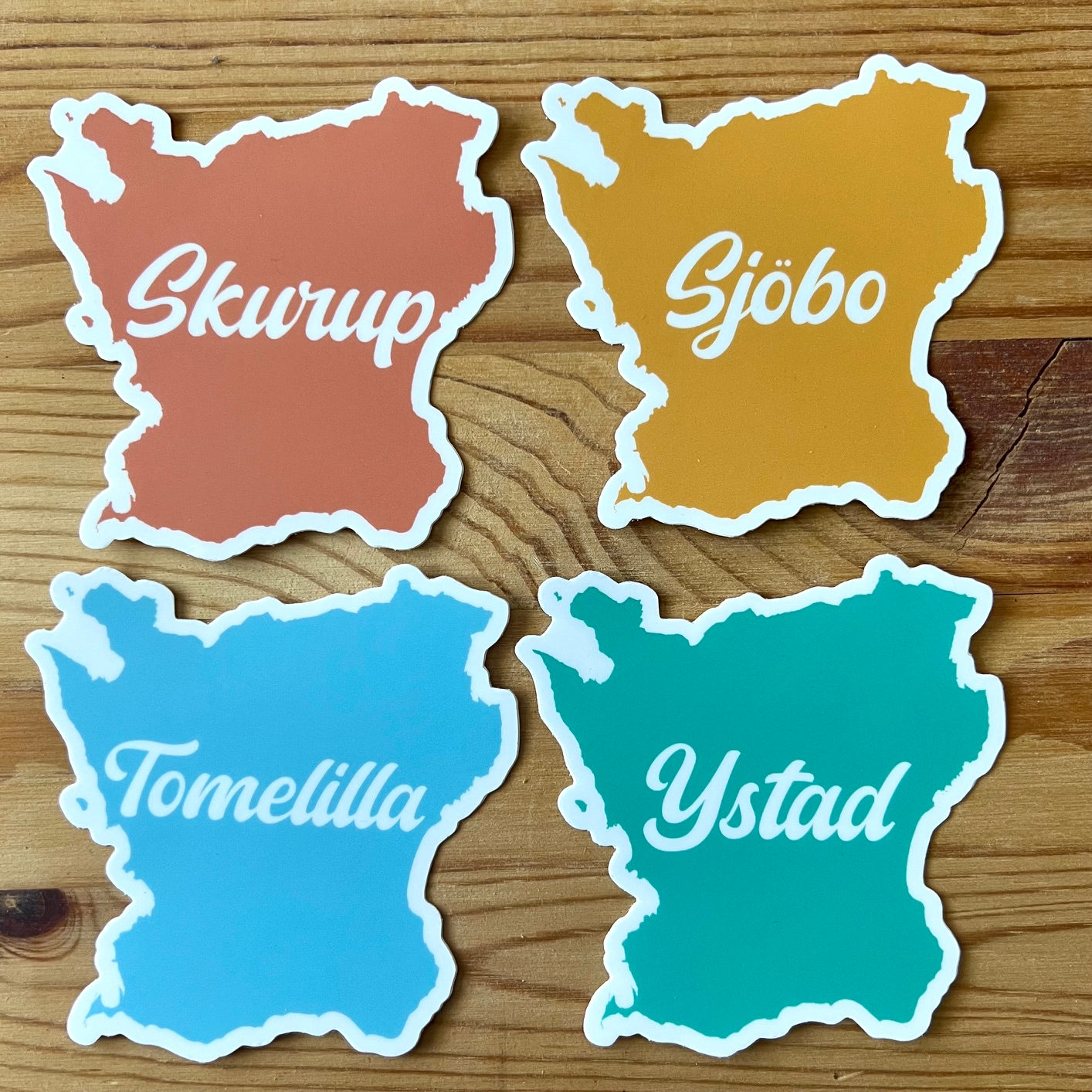 Nyssa Skåneorter sticker featuring colorful illustrations of popular Skåne region plants and landmarks on a white background.
