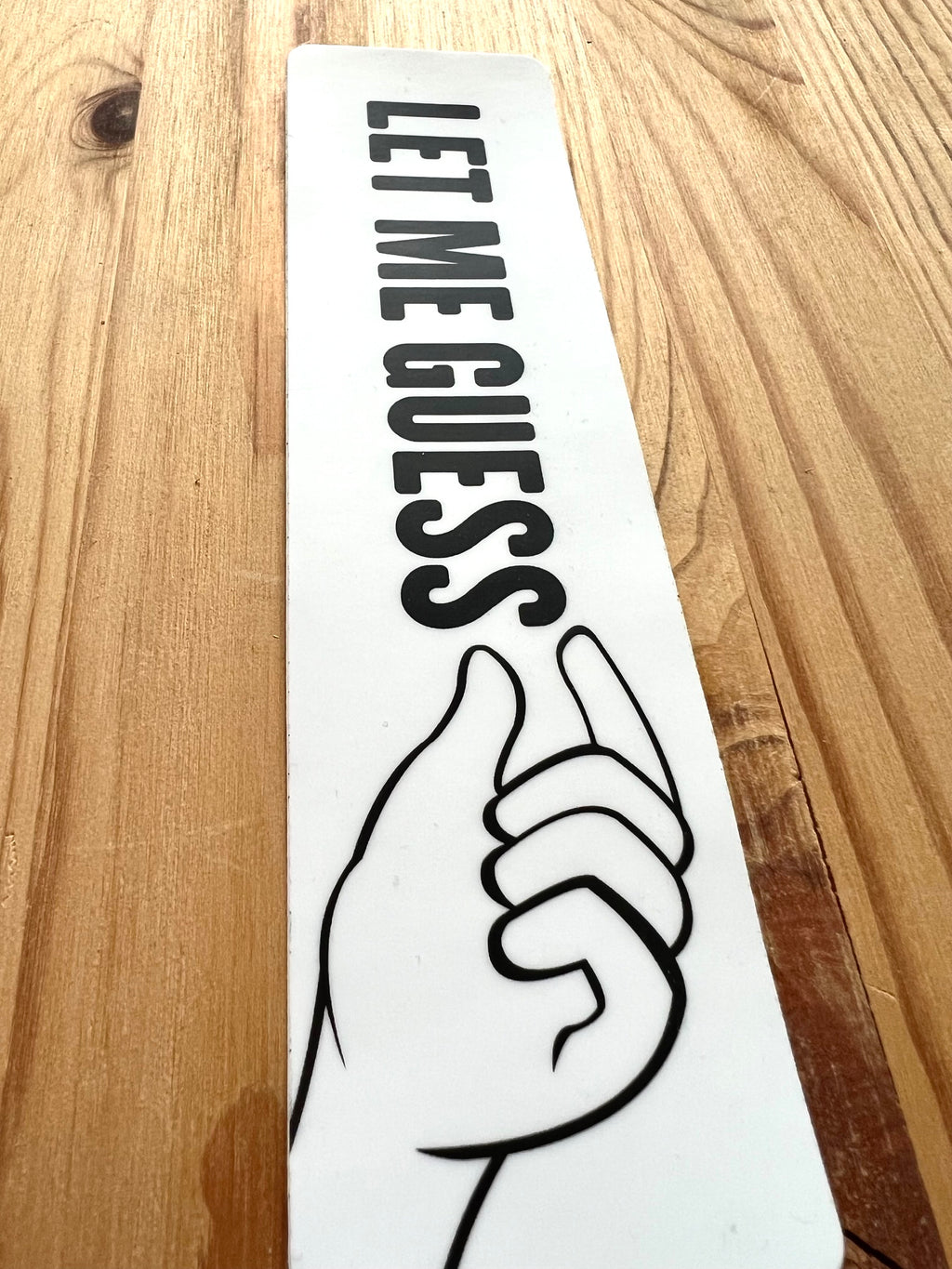 Colorful Nyssa "Let me guess" sticker featuring playful text and vibrant design on a white background.