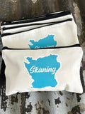 Nyssa Skåning necessity bag with zipper closure, compact makeup and toiletry organizer in durable material.