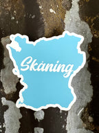 Nyssa Skåne magnet featuring a colorful design representing the Skåne region in Sweden.