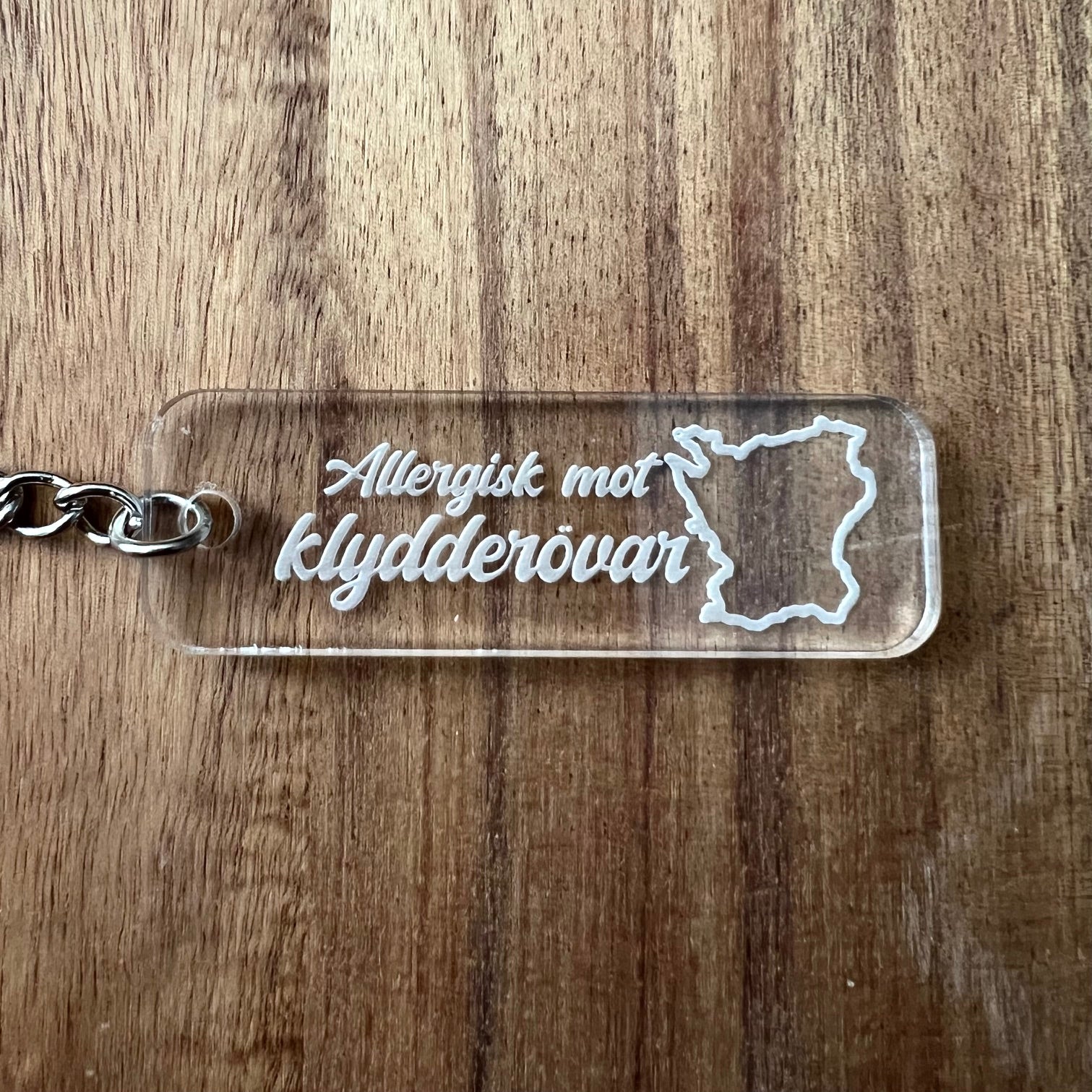 Nyssa Skåne keyring featuring a design inspired by the region, perfect for adding a touch of local charm to your keys.