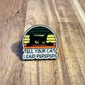 Nyssa "Tell You're Cat..." pin featuring a playful design, perfect for cat lovers and accessories enthusiasts.