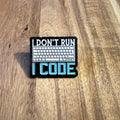 Nyssa "I Don't Run..." pin featuring bold text on a metal pin, perfect for accessorizing or decorating.