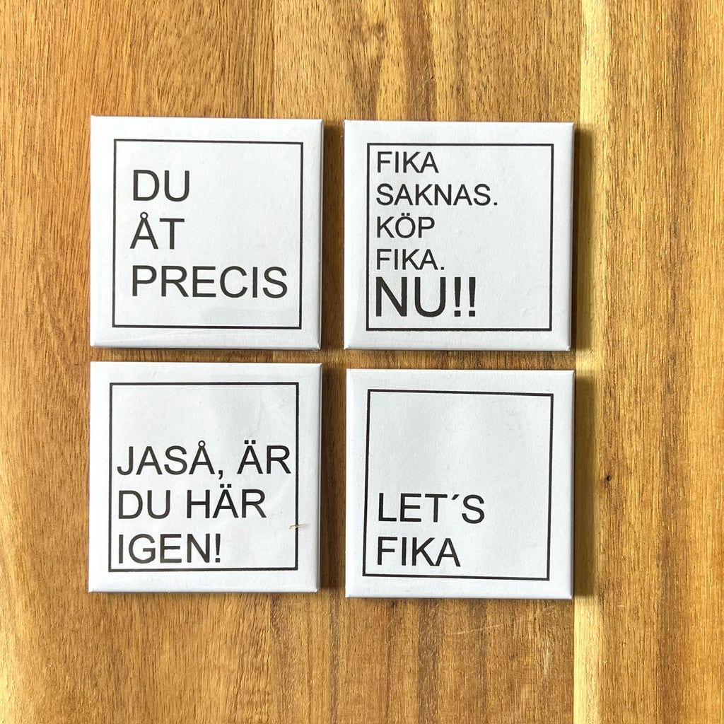 Set of four Nyssa LET'S FIKA fridge magnets with colorful coffee-themed designs on a white background.