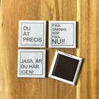 Set of four Nyssa LET'S FIKA refrigerator magnets with colorful coffee cup and pastry designs on a white background.