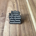 Nyssa "I Refuse" pin featuring bold text design on a metal pin backing, perfect for expressing personal boundaries and style.